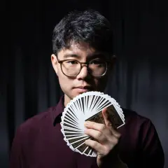 Professional headshot of Travis Kim